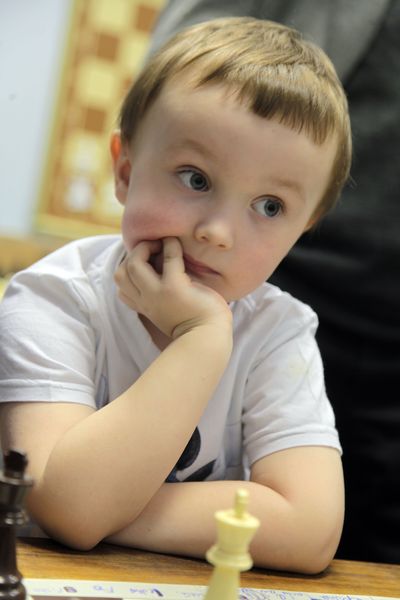 Mikhail Osipov show is the best. Three-year-old boy Misha Osipov plays  chess with Anatoly Karpov