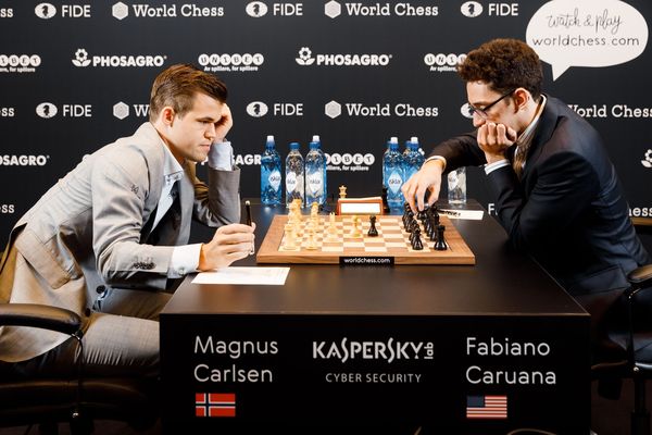Chess championship: Norway's Magnus Carlsen beats American Fabiano Caruana